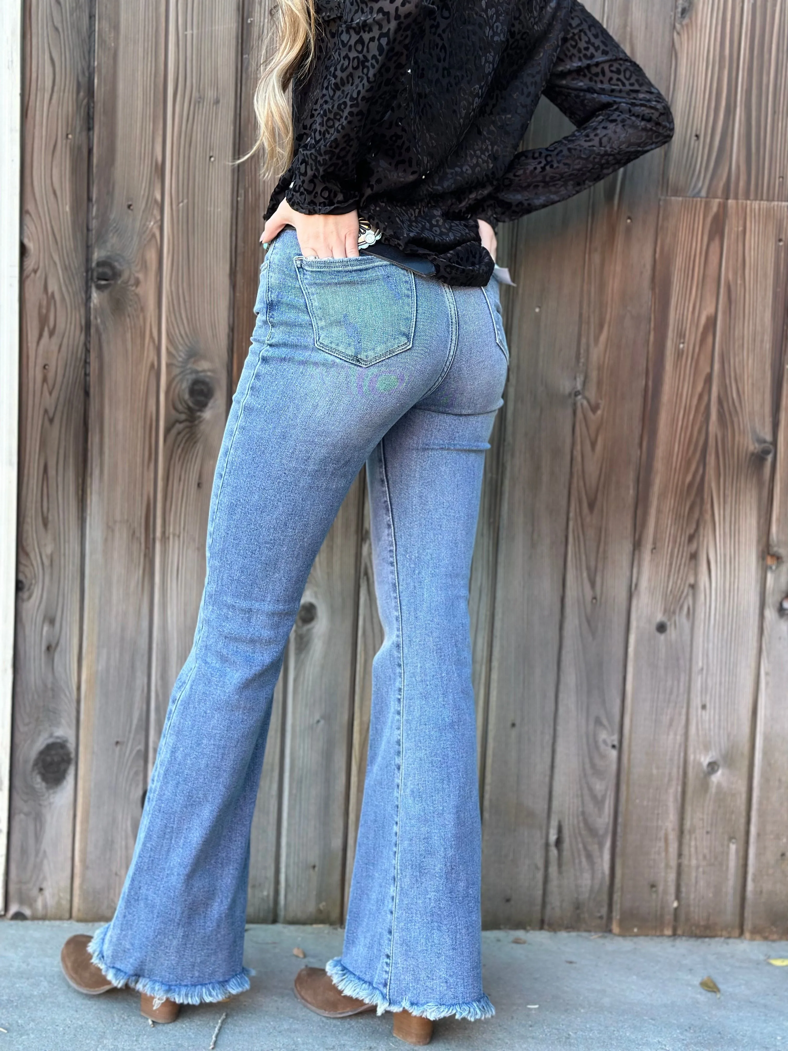 The Risen Frayed Bottom Flare Denim